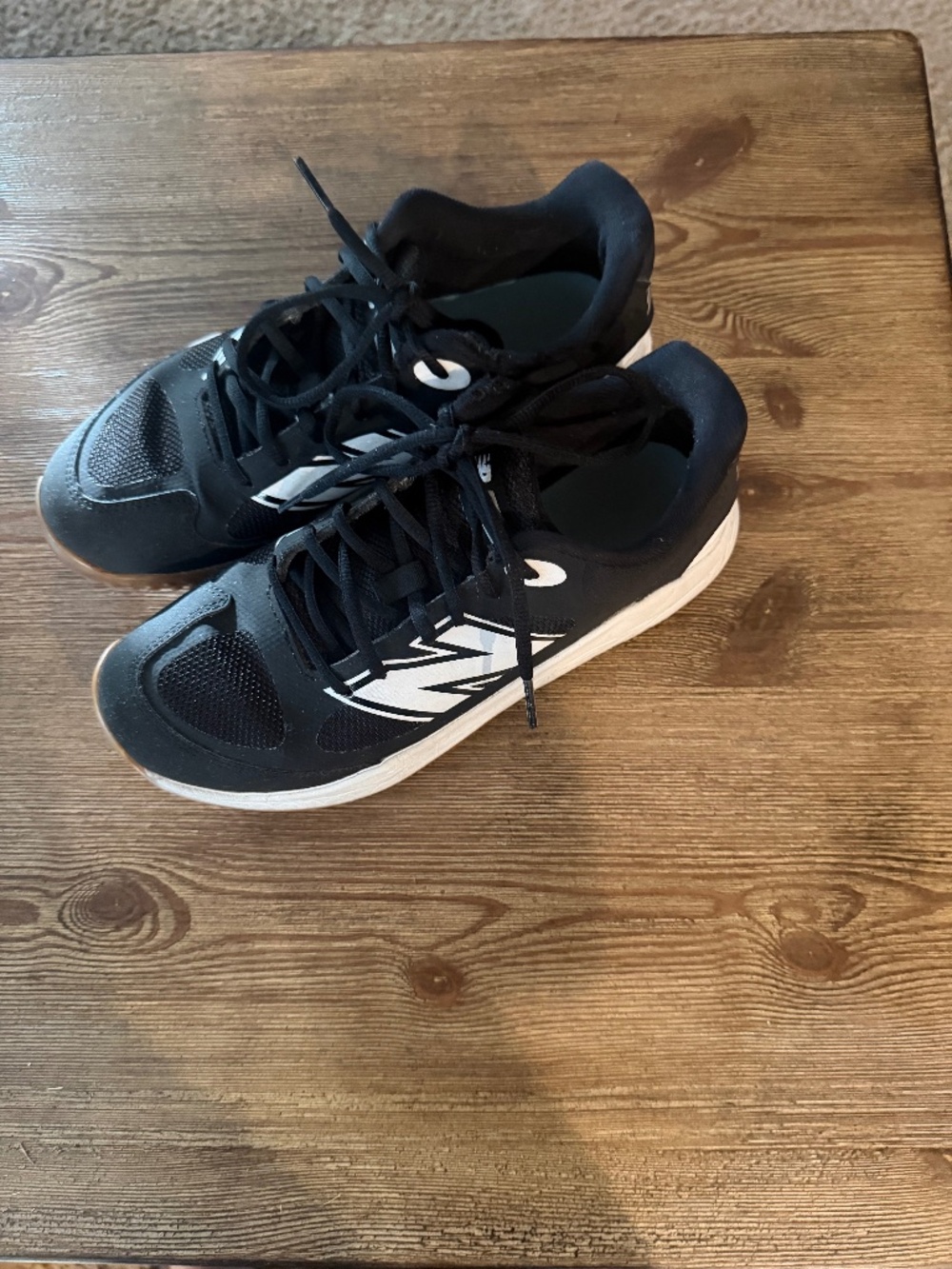 Men’s black and white New balance turf baseball cleats size 7